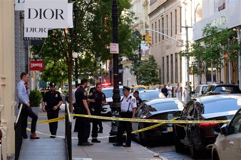 dior store shooting|Gunshots fired on bustling SoHo street .